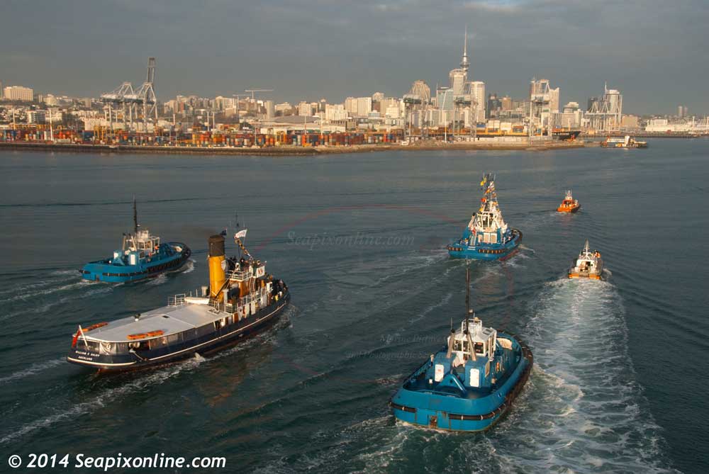 HAURAKI (2014/250grt/124dwt/IMO 9681015) - Ports of Auckland's latest tug fleet addition arrives in Auckland. The preserved 1935-built steam tug WILLIAM C DALDY and the two mainstays of the port's tug fleet WAKA KUME and WAIPAPA follow astern. 18 August 2014. Photo by © 2014 SeapixOnline.com/Ports of Auckland Ltd
