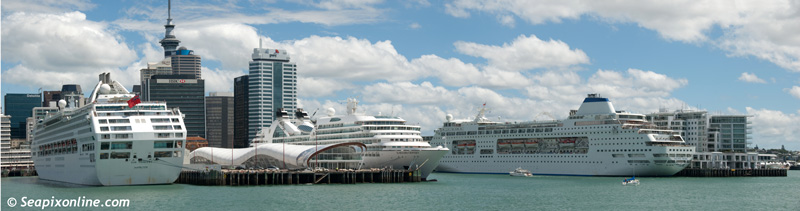SUN PRINCESS (At left:1999/77441grt/IMO 9000259. Renamed PACIFIC WORLD), SEABOURN ODYSSEY (Centre: 2009/32346grt/IMO 9417086. Sold to Mitsui OSK in early 2023 and renamed MITSUI OCEAN FUJI) and PACIFIC PEARL (1989/63524grt/IMO 8611398, ex-OCEAN VILLAGE, ARCADIA, STAR PRINCESS, SITMAR FAIRMAJESTY. She transferred to CMV and was renamed COLUMBUS in 2017 but laid up since 2021) - alongside Queens and Princes Wharf's simultaneously made for a very busy day at Ports of Auckland, New Zealand.   26 January 2012. Photo by SeapixOnline.com