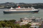 ID 10023 QUEEN MARY 2 (2003/148528grt/IMO 9241061) rounding North Head as she arrives in Auckland a day earlier than scheduled. Rough weather further south left in the trail of former Tropical Cyclone Pam...