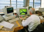 ID 8493 VESSEL TRAFFIC SERVICES (VTS) monitor all vessel movements at the Port of Southampton and in the waters of the Solent from their operations room looking south down Southampton Water.