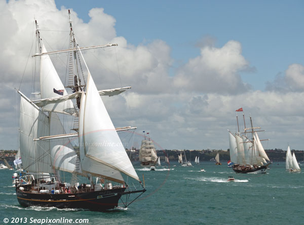YOUNG ENDEAVOUR (Australia) with EUROPA and OOSTERSCHELDE (both Dutch) in distance, sail out of Auckland following the inaugural tall ships festival., 28 October 2013. Photo by © 2013 SeapixOnline.com