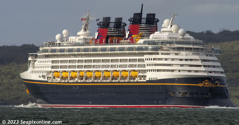 DISNEY WONDER (1999/83308grt/IMO 9126819) seen here sailing from Auckland for the third of her scheduled five 