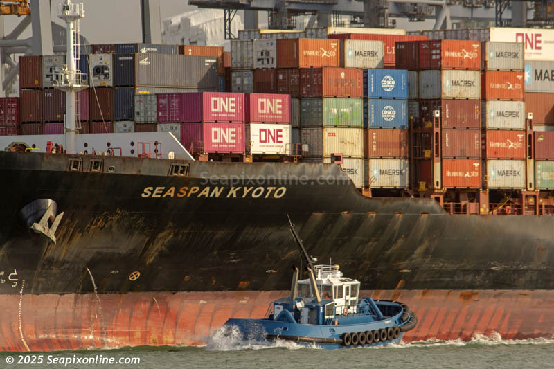 Built in 2011as BREVIK BRIDGE by Samsung Heavy Industries of S. Korea, SEASPAN KYOTO (46444grt/58430dwt/4528TEU/IMO 9492696. Renamed SEASPAN KYOTO in 2021) sails for Lyttelton following her maiden call in her current name. The tug WAIPAPA assists.
She is owned by Season Corp of Hong Kong, managed by Kawasaki Kisen Kaisha Ltd of Japan and operated by Ocean Network Express Pte of Singapore. 29 May 2025. Photo by Â© 2025 SeapixOnline.com