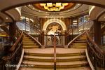 ID 6799 QUEEN ELIZABETH (2010/90901gt/IMO 9477498) - staircase from Deck 2 up to Deck 3 overlook the Grand Lobby.