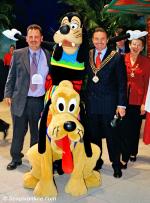 ID 7479 DISNEY WONDER (1999/83308grt/IMO 9126819) - Even Goofy tried upstaging the Mayor of Southampton Derek Burke (R) during his official visit to the new ship during the week long celebrations.