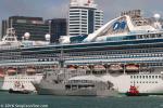 ID 10313 HMNZS WELLINGTON (P55) eases away from her Captain Cook Wharf after having been open to the public during the Ports of Auckland's Seaport 2016 event. She is dwarfed by Princess Cruises' GOLDEN...