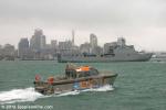 ID 10731 WAKATERE one of Ports of Auckland's pilot boats passes the Indonesian Navy's KRI BANDA ACEH (LPD593), a Makassar-class Landing Platform Dock, during the Royal New Zealand Navy's 75th anniversary...
